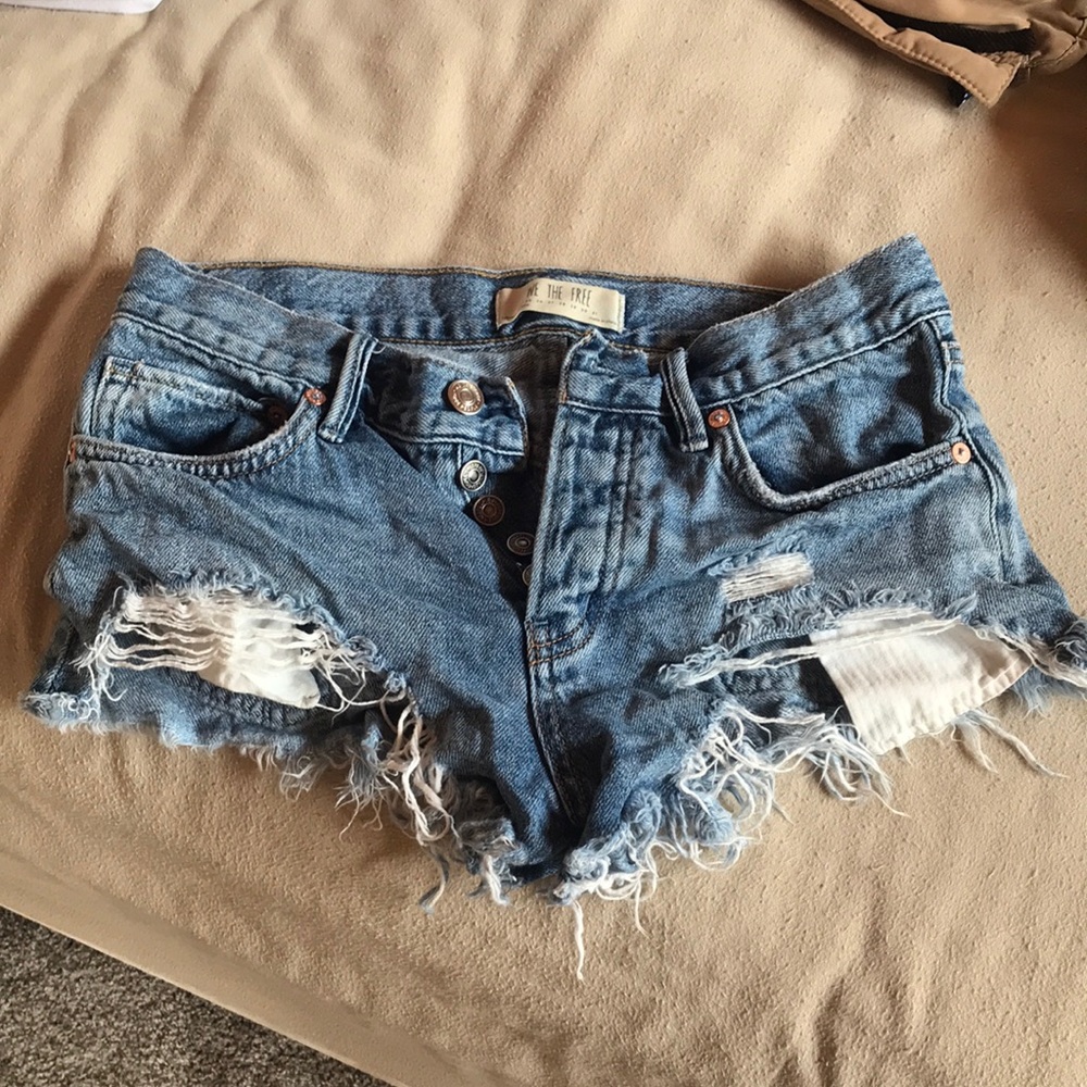 Free People destroyed denim shorts